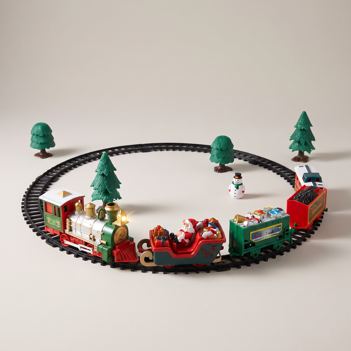 Elektrische Weihnachtseisenbahn für den Weihnachtsbaum, Zug mit Weihnachtsmann und Schienen