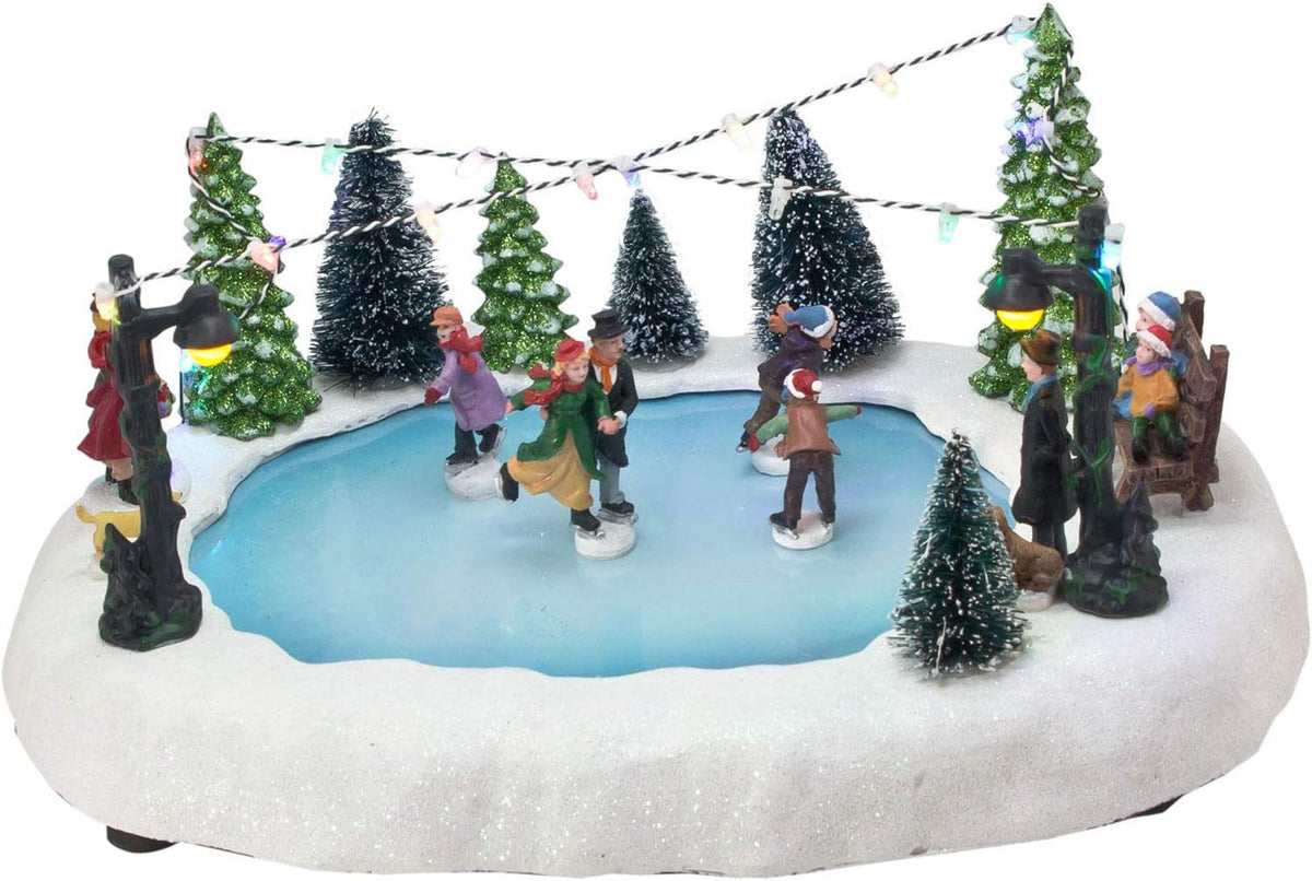 LED Weihnachtsszene Eisbahn mit fahrenden Schlittschuhläufern, beleuchtete Tischdeko